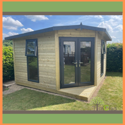 This image shows an insulated UPVC Corner Summerhouse